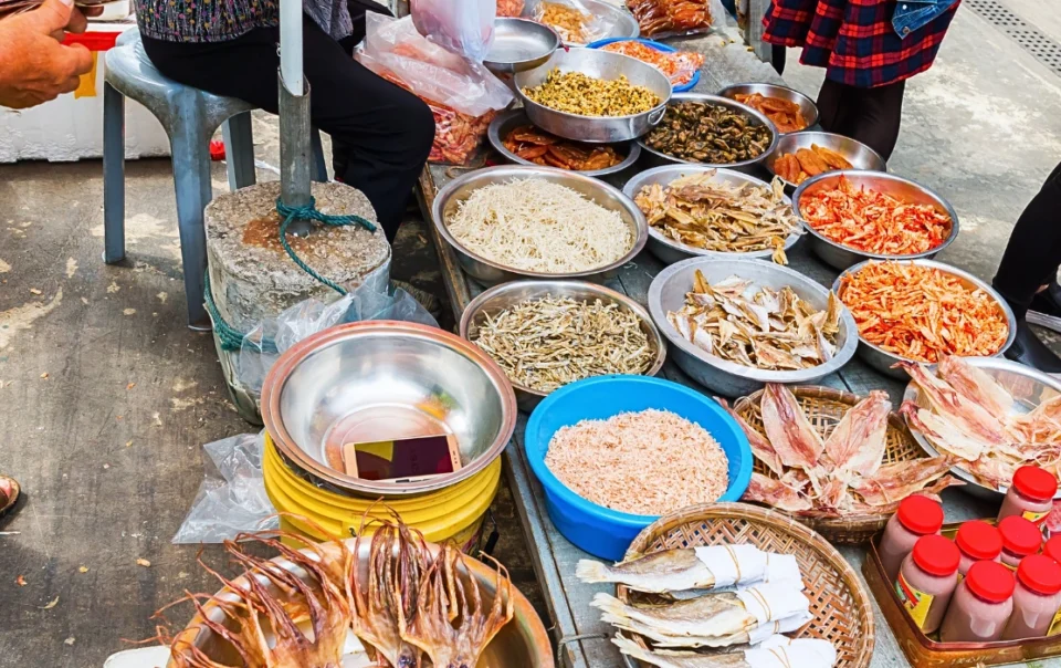 Display of salted fish, anchovies, and dried squid for sale at the Filipino Market in Kota Kinabalu