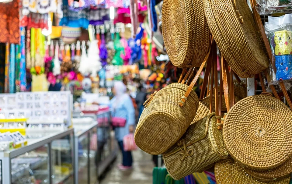 Woven bags, jewellery, and other souvenirs on display at the Filipino Market in Kota Kinabalu