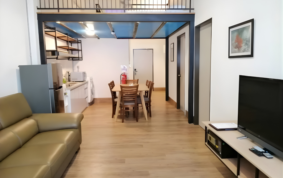 Interior of Polaris Suite in Kota Kinabalu, showing spacious rooms, modern furnishings, and family-friendly layout